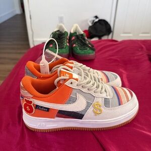 Nike Women’s Sneakers Orange White Multicolor Stripe Accents